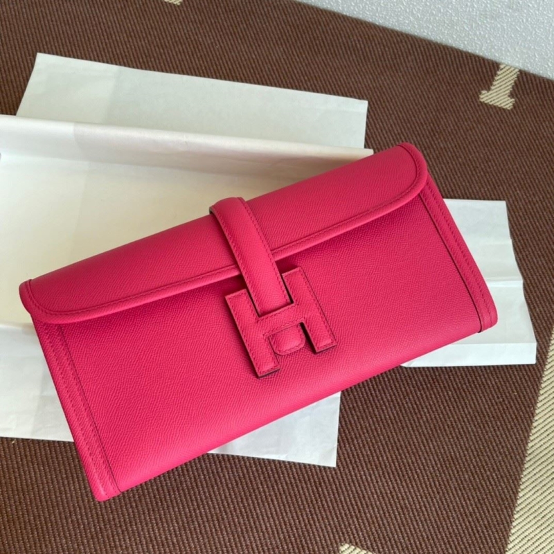 H**mes clutch bags